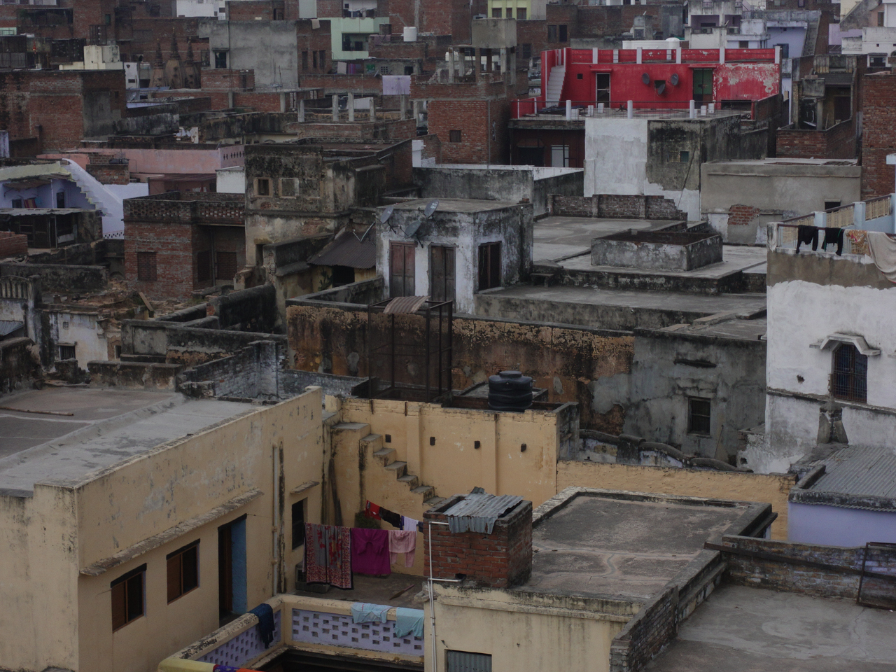 The wild and uncontrolled growth of buildings turn into picturesque and colorful paintings when watched from above.